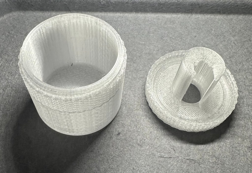 3D printed pencil sharpener container with integrated lid